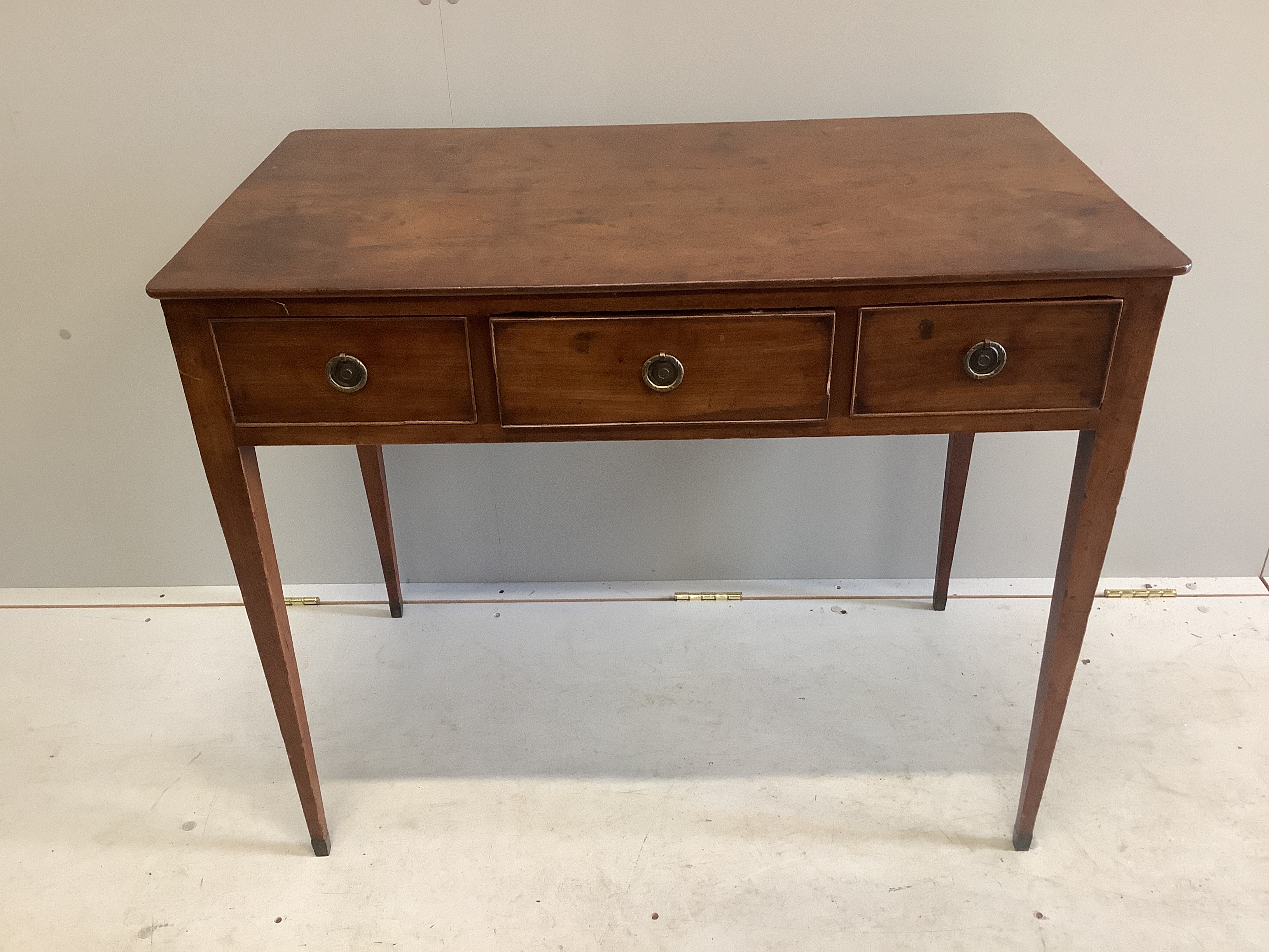 A George III mahogany three drawer side table, width 91cm, depth 52cm, height 75cm